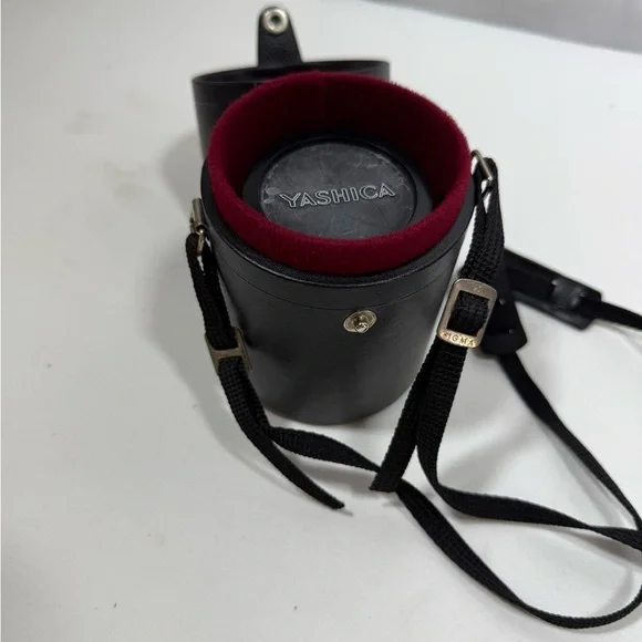 Yashica Zoom Lens 42- 75mm with case & Hakuba uv 55mm lens